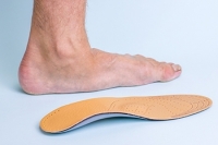 What Can Cause Flat Feet in Adults?